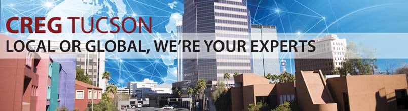 “Local to global, we’re your experts” is a tagline over a photo of downtown Tucson.